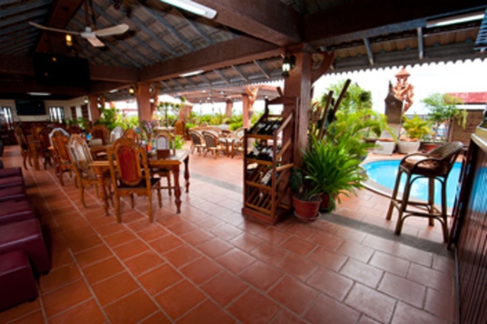 Imagen del bar/restaurante del Hotel Okay 1 Villa. Foto 2