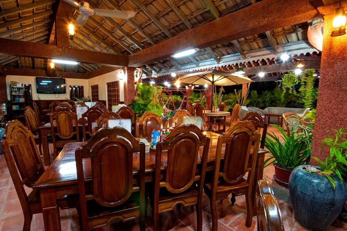 Imagen del bar/restaurante del Hotel Okay 1 Villa. Foto 3