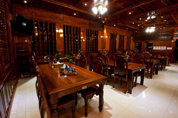 Imagen del bar/restaurante del Hotel Okay 1 Villa. Foto 4