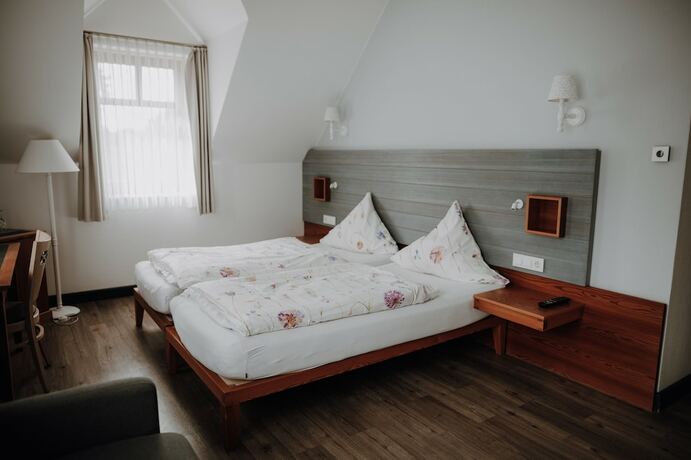 Imagen de la habitación del Hotel Okelmann\'s. Foto 15