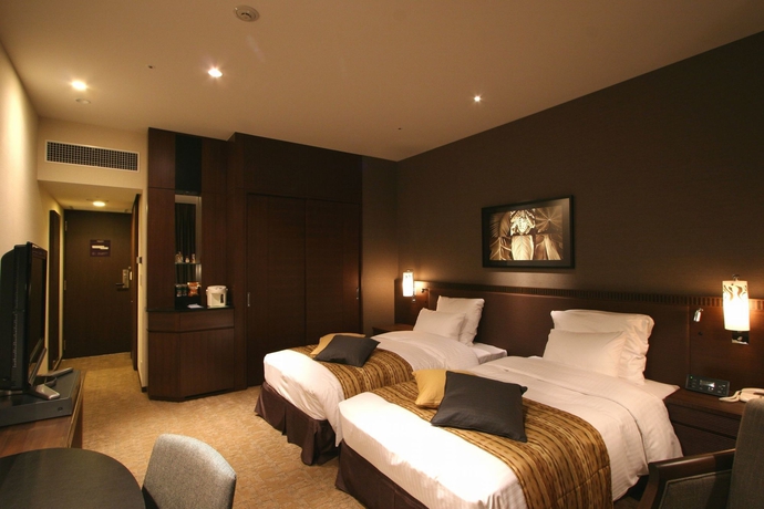 Imagen de la habitación del Hotel Okinawa Harborview. Foto 11