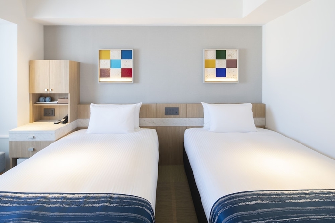 Imagen de la habitación del Hotel Okinawa Hinode Resort and Hot Spring. Foto 5