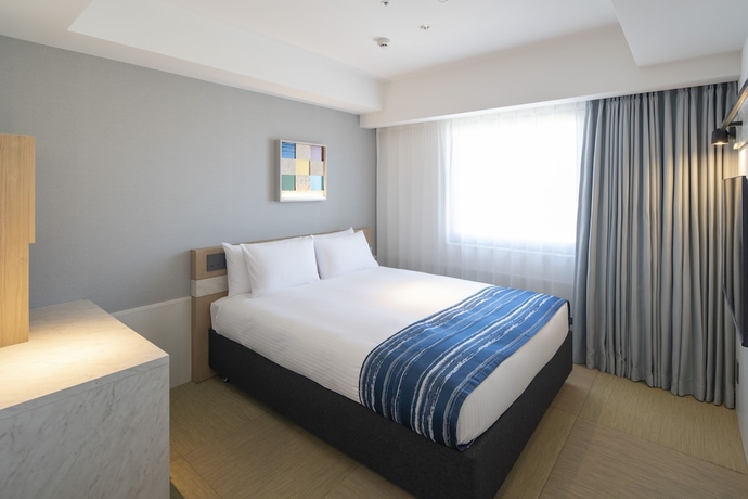 Imagen de la habitación del Hotel Okinawa Hinode Resort and Hot Spring. Foto 7