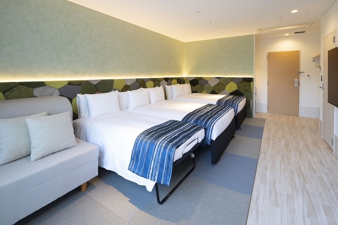 Imagen de la habitación del Hotel Okinawa Hinode Resort and Hot Spring. Foto 13