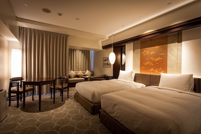 Imagen de la habitación del Hotel Okinawa Kariyushi Resort Exes Naha. Foto 4
