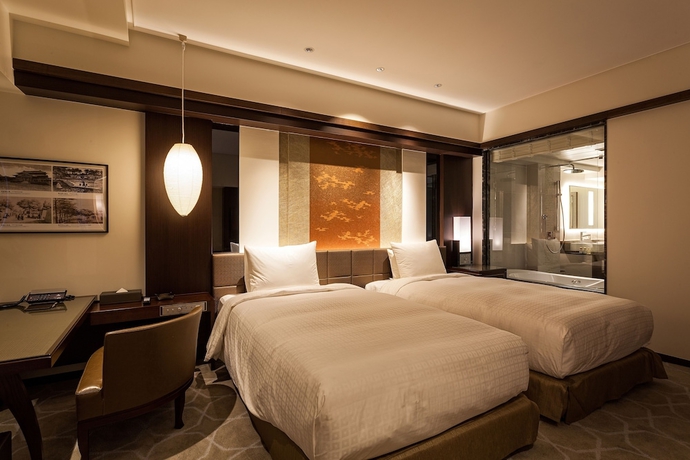 Imagen de la habitación del Hotel Okinawa Kariyushi Resort Exes Naha. Foto 5