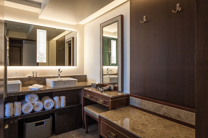 Imagen de la habitación del Hotel Okinawa Kariyushi Resort Exes Naha. Foto 13