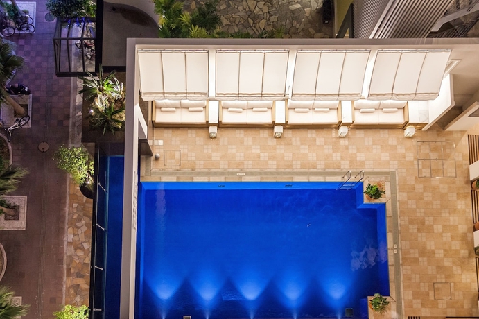 Imagen de la piscina del Hotel Okinawa Kariyushi Resort Exes Naha. Foto 19
