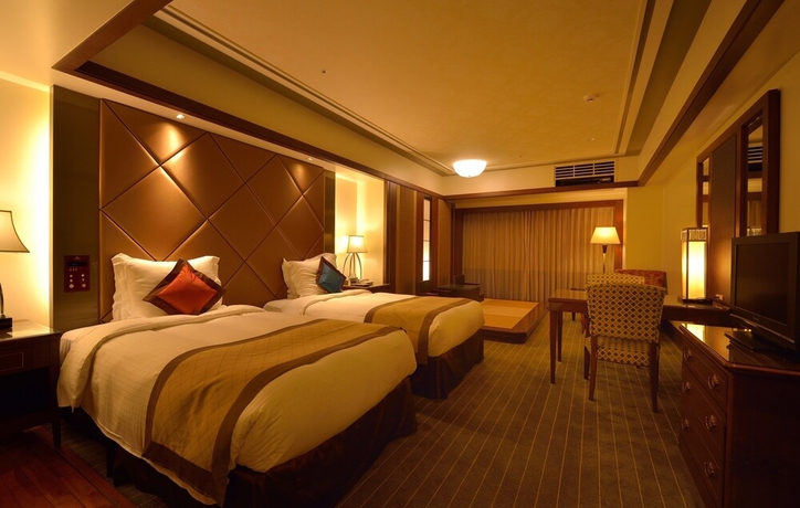 Imagen de la habitación del Hotel Okinawa Kariyushi Resort Exes Onna. Foto 4