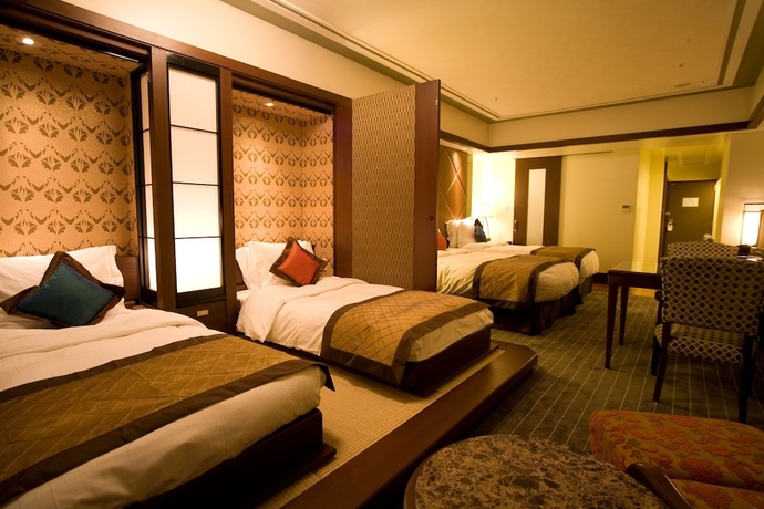 Imagen de la habitación del Hotel Okinawa Kariyushi Resort Exes Onna. Foto 5