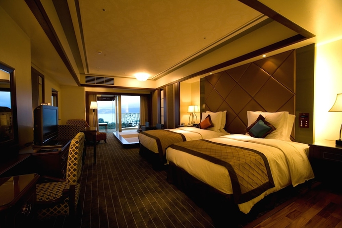 Imagen de la habitación del Hotel Okinawa Kariyushi Resort Exes Onna. Foto 8