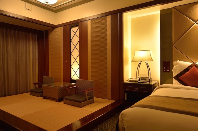Imagen de la habitación del Hotel Okinawa Kariyushi Resort Exes Onna. Foto 9