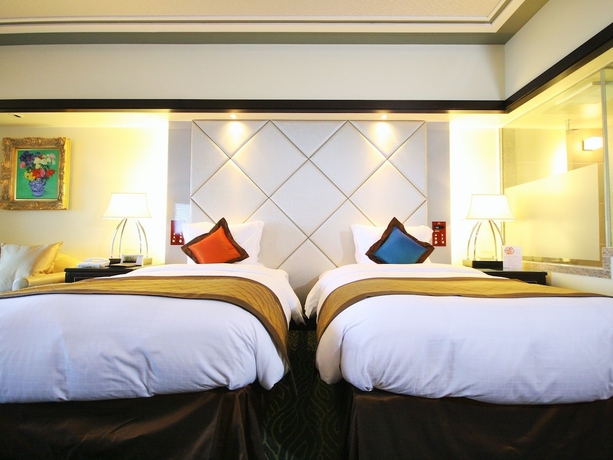 Imagen de la habitación del Hotel Okinawa Kariyushi Resort Exes Onna. Foto 14