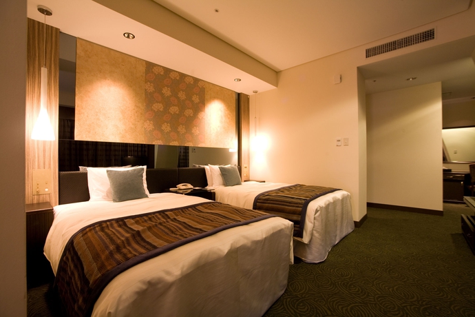 Imagen de la habitación del Hotel Okinawa Kariyushi Urban Resort Naha. Foto 7