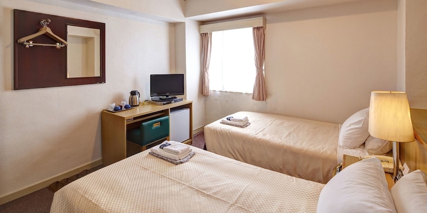 Imagen de la habitación del Hotel Okinawa Sunplaza. Foto 7