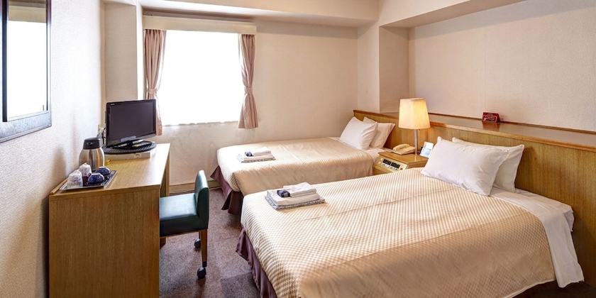 Imagen de la habitación del Hotel Okinawa Sunplaza. Foto 8