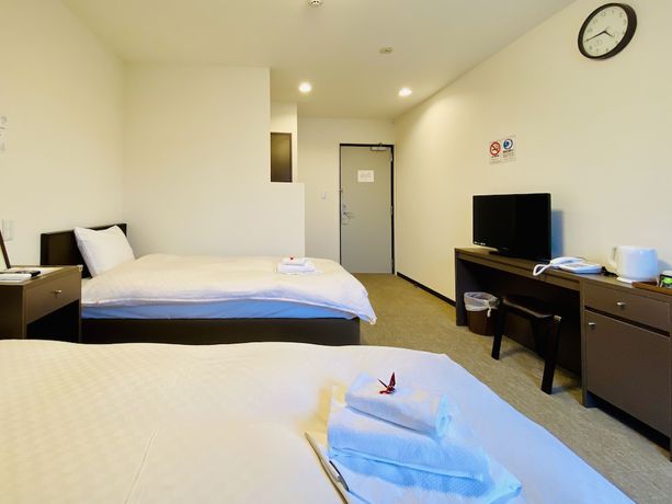 Imagen de la habitación del Hotel Okini Namba. Foto 13