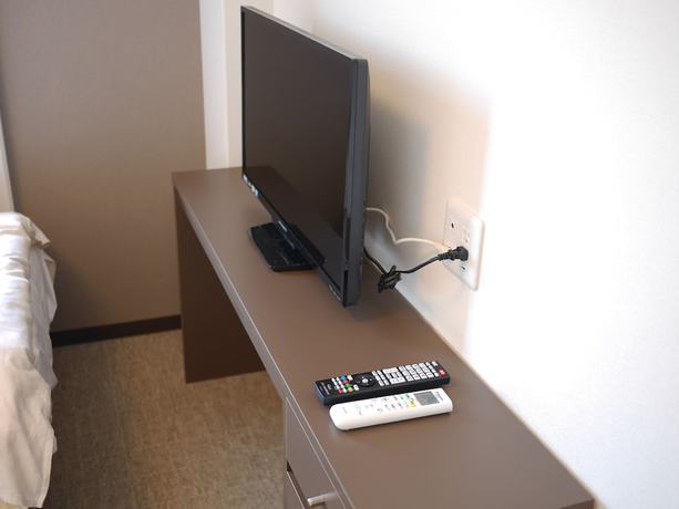 Imagen de la habitación del Hotel Okini Namba. Foto 14