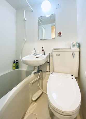 Imagen de la habitación del Hotel Okini Namba. Foto 15