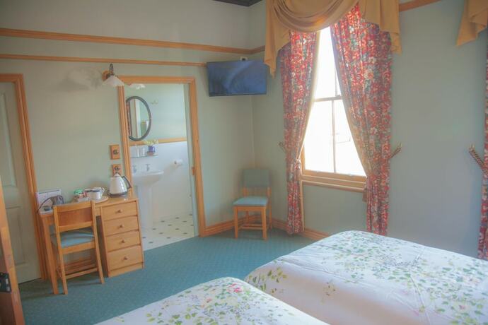 Imagen de la habitación del Hotel Okoroire Hot Springs. Foto 20