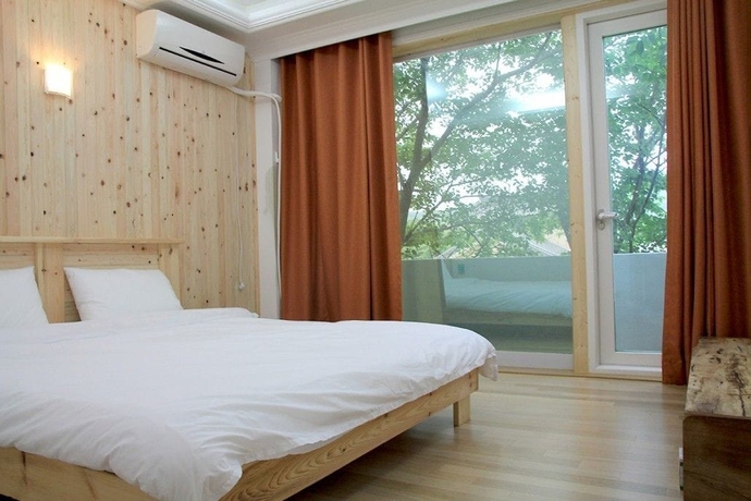 Imagen de la habitación del Hotel Ok-san Seowon Guest House. Foto 14
