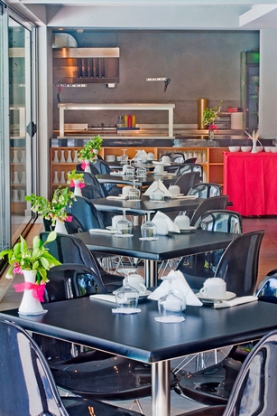 Imagen del bar/restaurante del Hotel Oktober Downtown Boutique. Foto 5