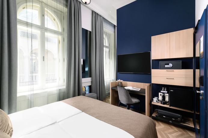 Imagen de la habitación del Hotel Oktogon Haggenmacher. Foto 4