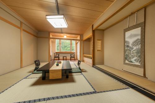 Imagen de la habitación del Hotel Okuhida Yakushi No Yu Honjin. Foto 2