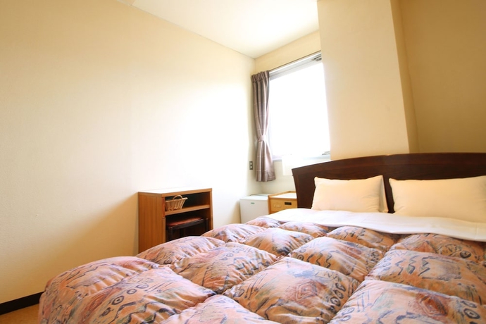 Imagen de la habitación del Hotel Okuni. Foto 7
