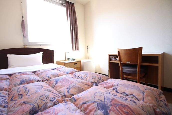 Imagen de la habitación del Hotel Okuni. Foto 11