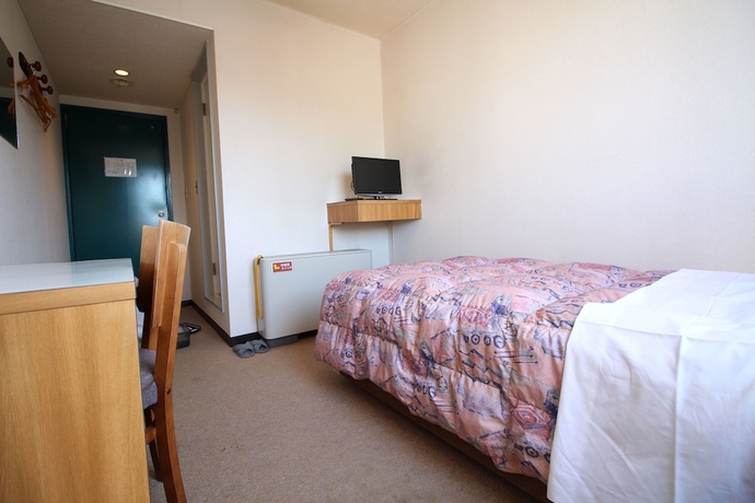Imagen de la habitación del Hotel Okuni. Foto 12