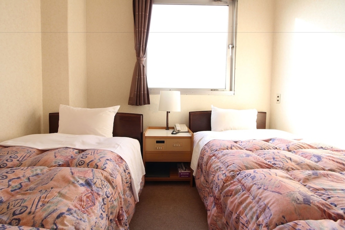 Imagen de la habitación del Hotel Okuni. Foto 14