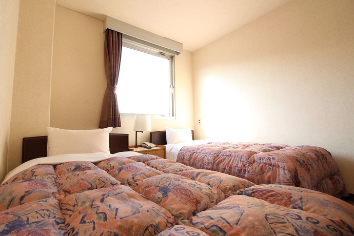 Imagen de la habitación del Hotel Okuni. Foto 15