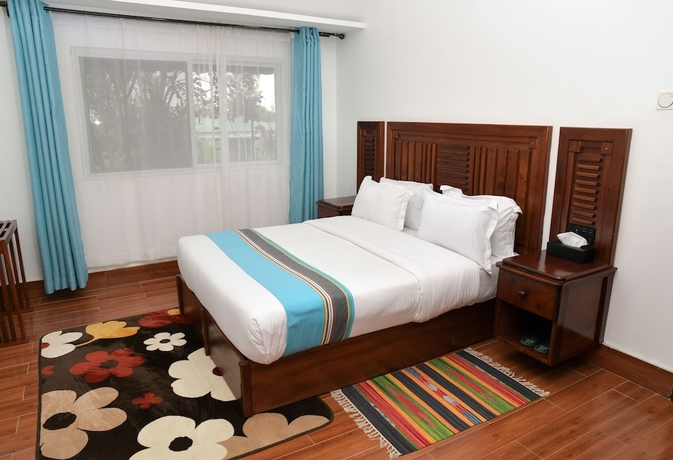 Imagen de la habitación del Hotel Ol Muteita Lodge. Foto 11