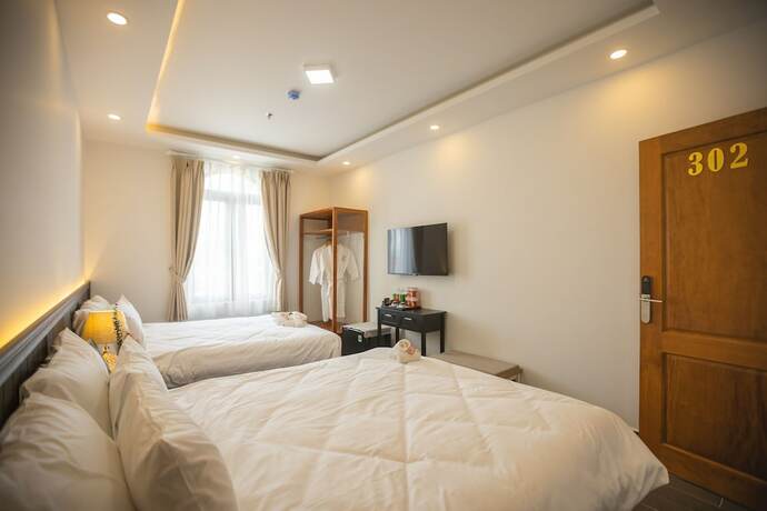 Imagen de la habitación del Hotel Olagihotel. Foto 18