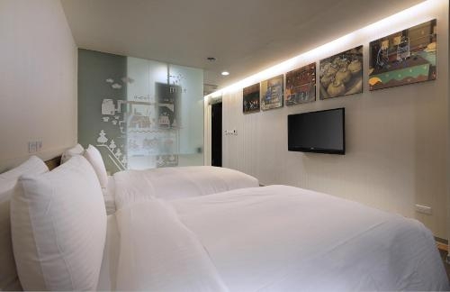 Imagen de la habitación del Hotel Olah Poshtel - Taichung Station. Foto 8