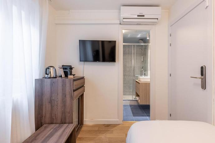 Imagen de la habitación del Hotel Olala Granada Suites. Foto 3