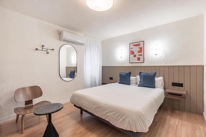 Imagen de la habitación del Hotel Olala Granada Suites. Foto 5