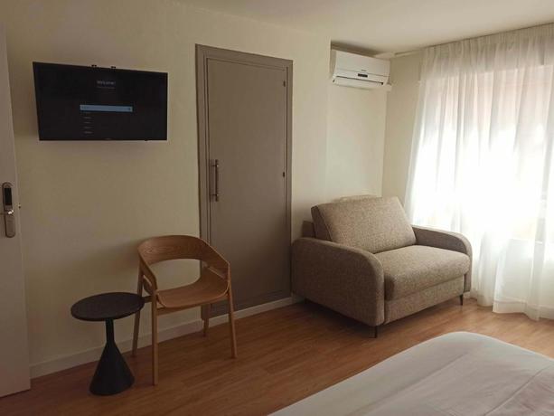 Imagen de la habitación del Hotel Olala Granada Suites. Foto 6