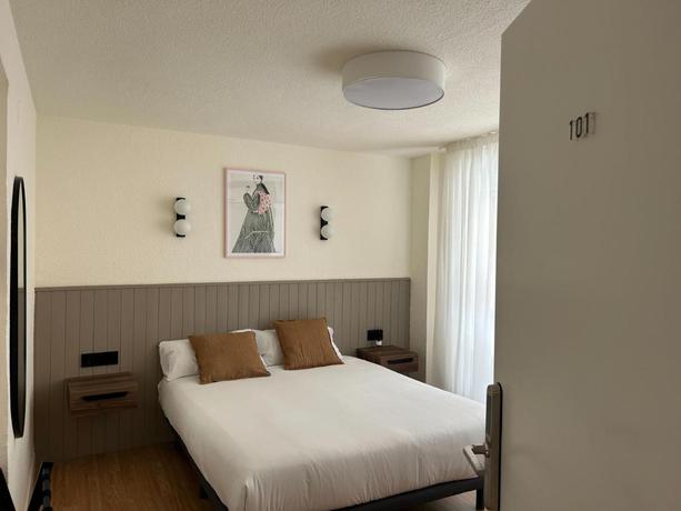 Imagen de la habitación del Hotel Olala Granada Suites. Foto 7