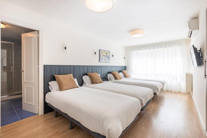 Imagen de la habitación del Hotel Olala Granada Suites. Foto 8