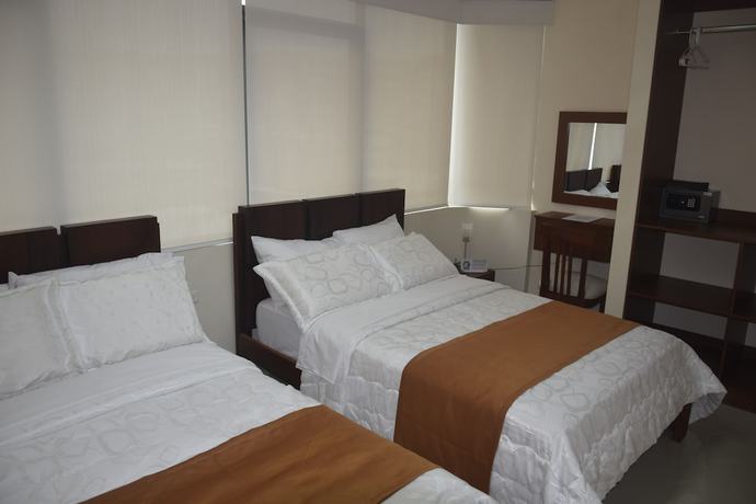 Imagen de la habitación del Hotel Olans Group. Foto 18