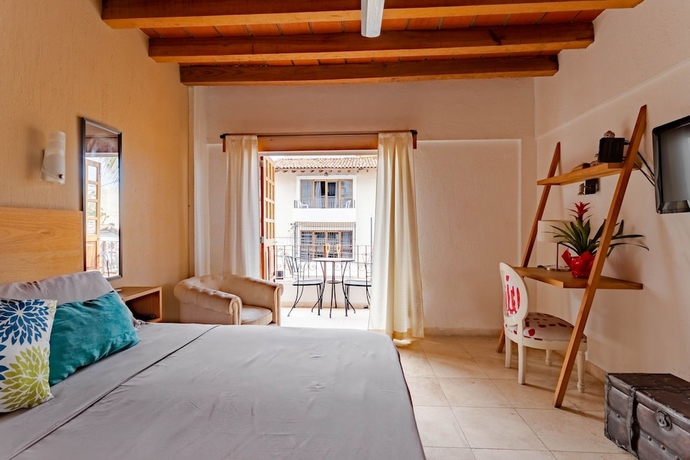 Imagen de la habitación del Hotel Olas Altas Suites. Foto 5