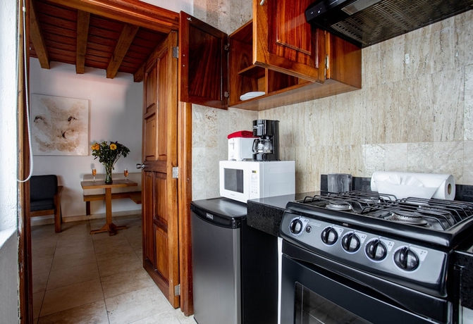 Imagen de la habitación del Hotel Olas Altas Suites. Foto 10
