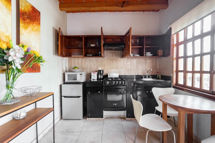 Imagen de la habitación del Hotel Olas Altas Suites. Foto 13