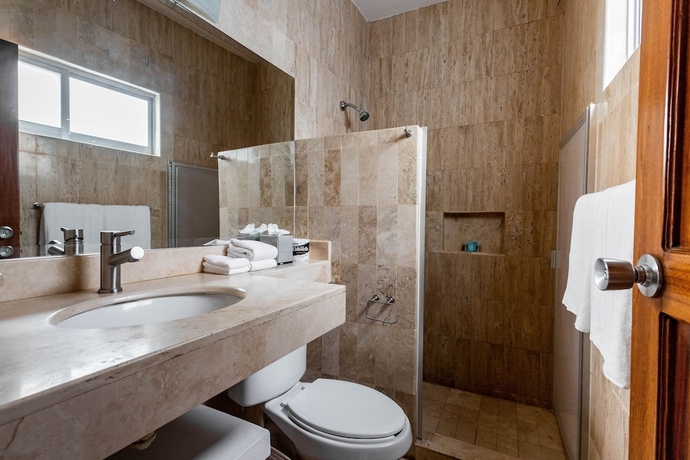 Imagen de la habitación del Hotel Olas Altas Suites. Foto 15