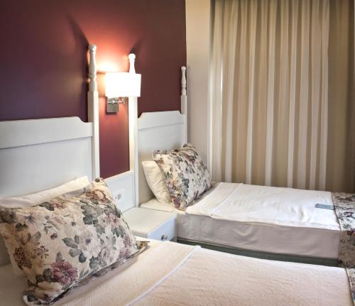 Imagen de la habitación del Hotel Olbios Marina Resort. Foto 6