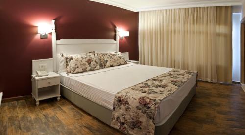 Imagen de la habitación del Hotel Olbios Marina Resort. Foto 7