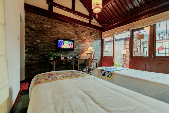 Imagen de la habitación del Hotel Old Beijing Square Hotel. Foto 4