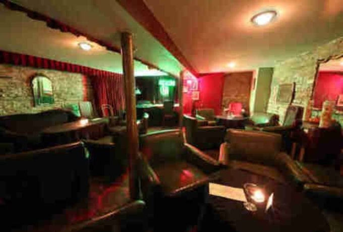 Imagen del bar/restaurante del Hotel Old Chicago Inn. Foto 3